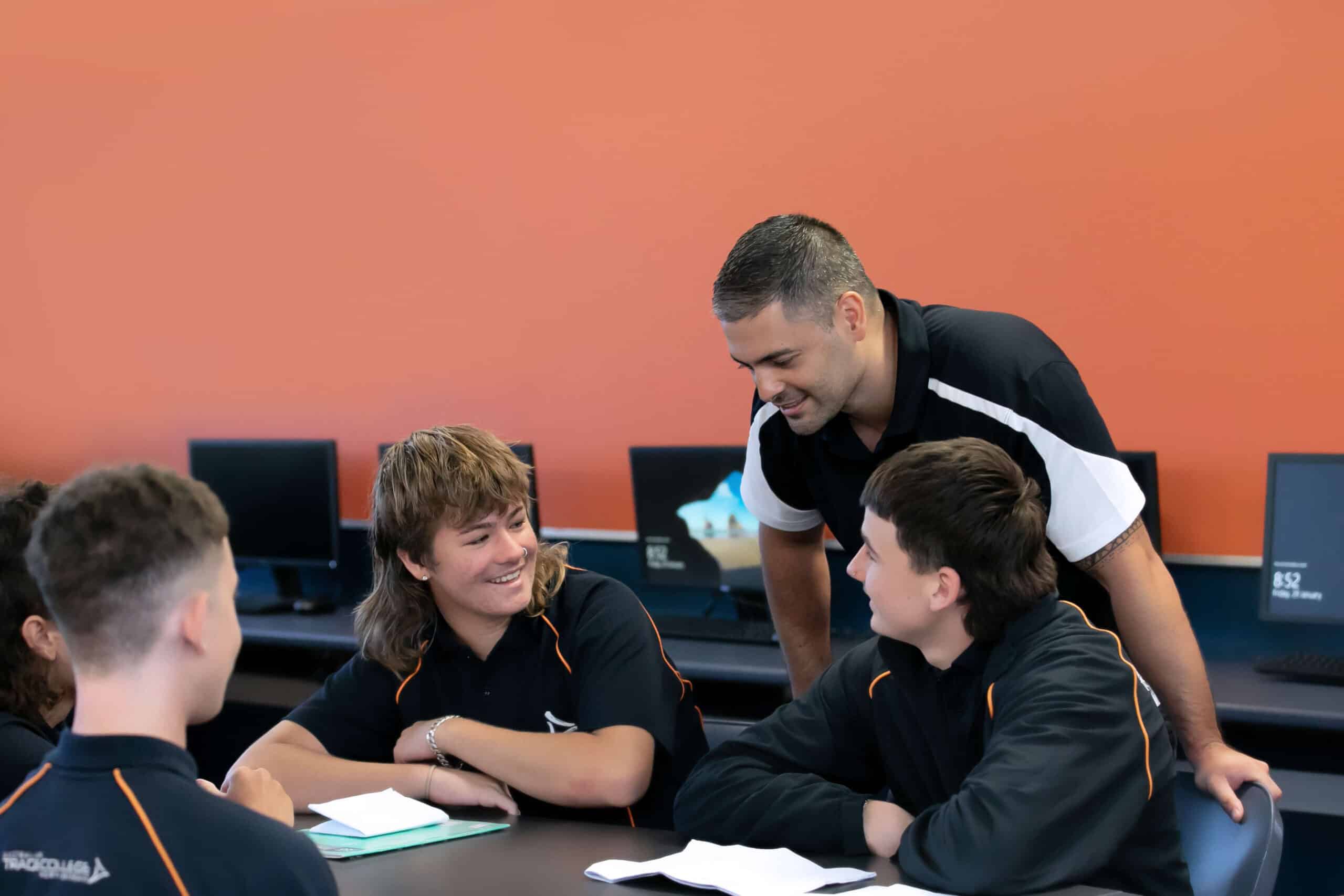 Industry Preparation students with teachers discussing career pathway options